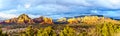 Panorama of a Sunset over Thunder Mountain and other red rock mountains surrounding the town of Sedona, Arizona Royalty Free Stock Photo