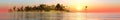 Panorama Sunset over a tropical island. Royalty Free Stock Photo