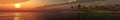 Panorama Sunset over a tropical island. Royalty Free Stock Photo