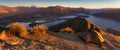 Panorama at sunset of Roys Peak between Wanaka and Queenstown with a lake and Mount Aspiring and cook of the new zealand alps. Royalty Free Stock Photo