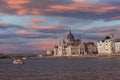 Panorama in sunset scene with building of Hungarian parliament at Danube river in Budapest city, Hungar Royalty Free Stock Photo