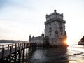 Panorama sunset view of medieval historic defense fortification bastion Torre Belem Tower in Tagus river Lisbon Portugal