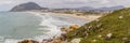 Panorama with Surfers in Costao do Santinho beach Royalty Free Stock Photo