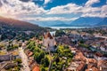 Panorama of Thun city with Alps and Thunersee lake, Switzerland. Historical Thun city and lake Thun with Bernese Highlands swiss Royalty Free Stock Photo