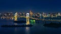 Panorama of tokyo cityscape and rainbow bridge at night