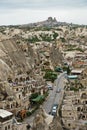 Panorama from a top of a hill over Goreme with Uchisar castle in background at Cappadocia, Anatolia