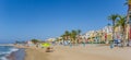 Panorama of tourists enjoying the beach in colorful Villajoyosa