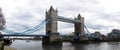 A panorama of Tower Bridge in London during overcast weather Royalty Free Stock Photo