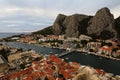 Omis town surrounded by mountains. Travel in Croatia. Royalty Free Stock Photo