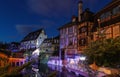 Panorama of traditional Alsatian half-timbered houses and river Lauch in little Venice quarter, old town of Colmar, Alsace, France Royalty Free Stock Photo