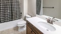 Panorama Traditional bathroom interior with checkered black and white shower curtain Royalty Free Stock Photo