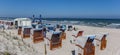 Panorama of traditional chairs on the beach of Binz on Rugen island Royalty Free Stock Photo