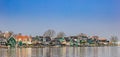 Panorama of traditional dutch houses at the Zaan river in Zaandijk