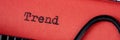 Panorama. Trend - Text written on a red paper made by old typewriter