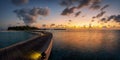 Panorama of a tropical sunset over a little paradise island Royalty Free Stock Photo