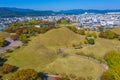 Panorama of Tumuli park and other royal tombs in the center of Korean town Gyeongju Royalty Free Stock Photo