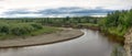 Panorama turn wild little kempendyay river in the North of Yakutia with cliffs of clay and spruce Royalty Free Stock Photo