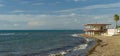 Panorama of the Tuscan coast with bathhouse designed by Fuksas and a beach 