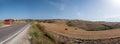 Panorama of Tuscany countryside in the summer with streed and abandoned house Royalty Free Stock Photo