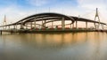 Panorama Twin Suspension bridge connect to highway interchange in Bangkok Thailand during sunset