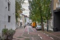 Panorama of a typical suburban dutch street in a countryside village of the netherlands, called Vaals, in Limburg, with houses and