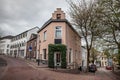 Panorama of a typical suburban dutch street in a countryside village of the netherlands, called Vaals, in Limburg, with houses and Royalty Free Stock Photo