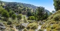 A panorama view across the Imbros Gorge near Chania, Crete on a bright sunny day Royalty Free Stock Photo