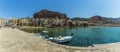 A panorama view across the old harbour of Cefalu, Sicily with the mesa and mountains as a backdrop Royalty Free Stock Photo