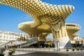 A panorama view across the Plaza of Incarnation including the mushroom shaped roof top in Seville, Spain