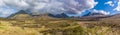 A panorama view across the unspoilt landscape of Isle of Skye towards the distant Cuillin Hills, Scotland Royalty Free Stock Photo