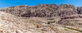 A panorama view across the valley towards the Royal Tombs in the ancient city of Petra, Jordan Royalty Free Stock Photo