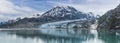 A panorama view across the waters of Glacier Bay towards the Reid Glacier, Alaska Royalty Free Stock Photo