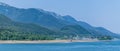 A panorama view along the forested shoreline in the Gastineau Channel towards Juneau, Alaska Royalty Free Stock Photo
