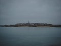 Panorama view of atlantic coast walled city historical old town of Saint Malo at blue hour from Dinard Brittany France