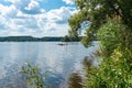 Panorama view of the Baltic Sea on sunny summer day. Rocky shores of Scandinavia covered with evergreen forest. Beautiful canoe