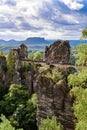 Panorama view on the Bastei bridge. Bastei is famous for the beautiful rock formation in Saxon Switzerland National Park, near Royalty Free Stock Photo