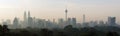 Panorama view of beautiful kuala lumpur cityscape skyline in the hazy or foggy morning enviroment Royalty Free Stock Photo