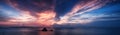 Panorama view of beautiful sunset above the sea at tropical beach Royalty Free Stock Photo