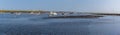 A panorama view of boats moored in Brancaster Bay near Burnham, Norfolk, UK