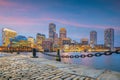 Panorama view of Boston skyline with skyscrapers over water at twilight inUSA Royalty Free Stock Photo