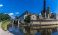 A panorama view from the bottom of three locks gates on the Leeds, Liverpool canal at Bingley, Yorkshire, UK Royalty Free Stock Photo