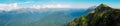 panorama: View of the Caucasus mountains at sunset. Staircase in the mountains Royalty Free Stock Photo