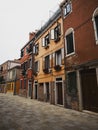 Panorama view of charming picturesque historic colourful house facades in empty streets of Murano Venice Veneto Italy