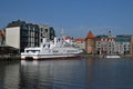 Panorama view of cityscape with a white tourist ship mooring in the Old Town in Gdansk Royalty Free Stock Photo