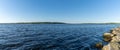 Panorama view of the dark blue waters of a long and wide fjord in Denmark