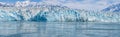 A panorama view in Disenchartment Bay across the snout of the Hubbard Glacier, Alaska Royalty Free Stock Photo