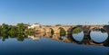 Panorama view of the Dordogne River and old stone bridge leading to Bergerac Royalty Free Stock Photo