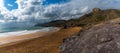 Panorama view of empty beaches and mountainous coast in Murcia under an expressive sky Royalty Free Stock Photo