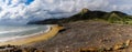 Panorama view of empty beaches and mountainous coast in Murcia under an expressive sky Royalty Free Stock Photo