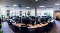 Panorama View of an Empty Call Center Operator Workspace. Generative AI Royalty Free Stock Photo